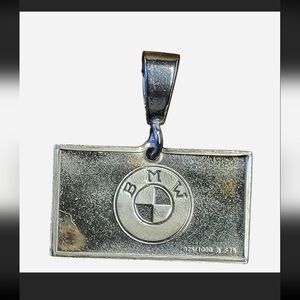 BMW pendant, 15x22mm, 0.15" thick, featuring a BMW logo with a BMW date stamp on